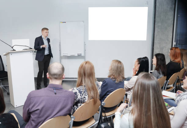 istock businessman conducts training for the business team 1585855988