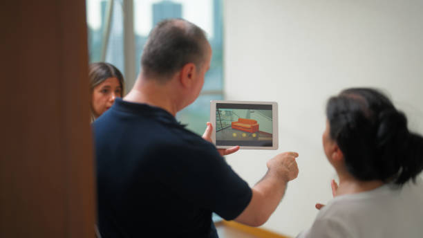 Senior couple using augmented reality technology to check furniture in house