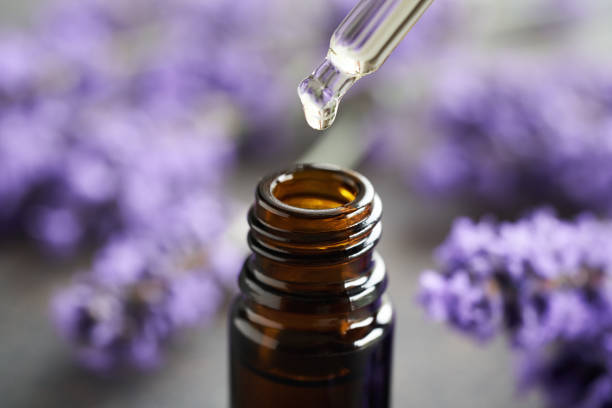 istock Dropping essential oil into a bottle 1585888640