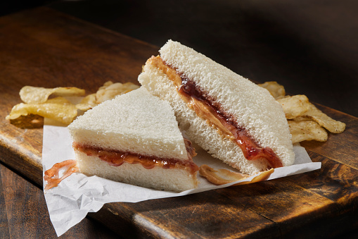 Crustless Peanut Butter and Strawberry Jam Tea Sandwich with Kettle Potato Chips