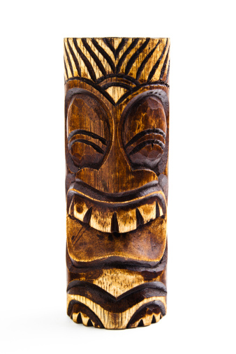A carved wooden tiki statue.