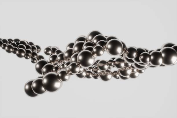 istock Silver shiny metal balls on grey background 1585944981