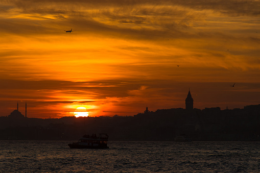 Silhouette of Istanbul at sunset. Bosphorus panoramic view from Uskudar