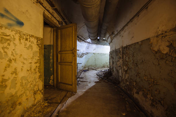 istock Tunnel in abandoned Soviet bunker. Turn the tunnel 1585980077