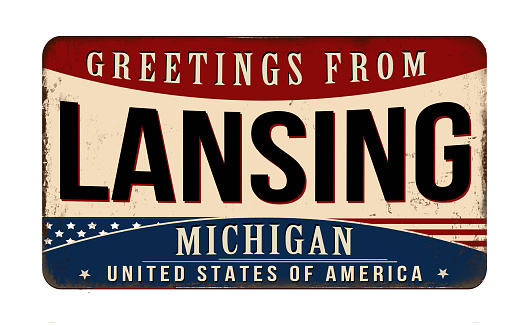 Greetings from Lansing vintage rusty metal sign on a white background, vector illustration