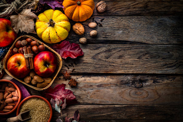 istock Autumn or Thanksgiving decoration on rustic wood table. Copy space 1586061630