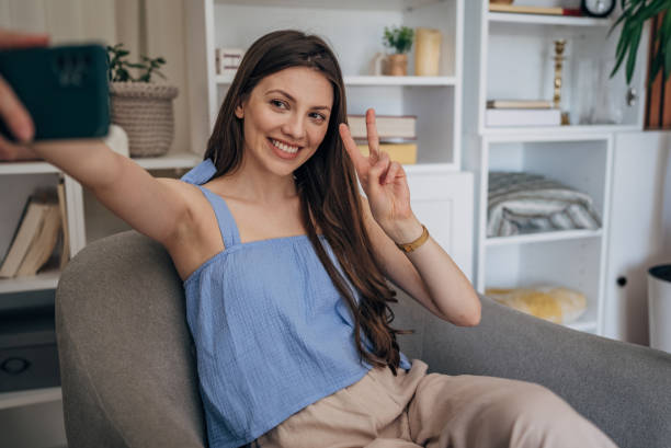 istock Woman taking a selfie 1586071708