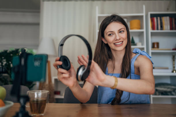 istock Woman vlogging at home 1586076741