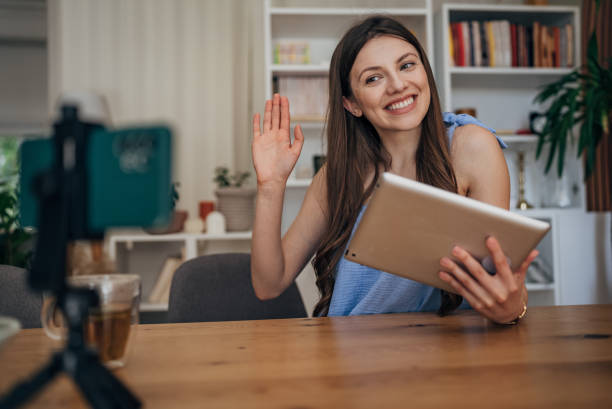 istock Woman vlogging at home 1586076745