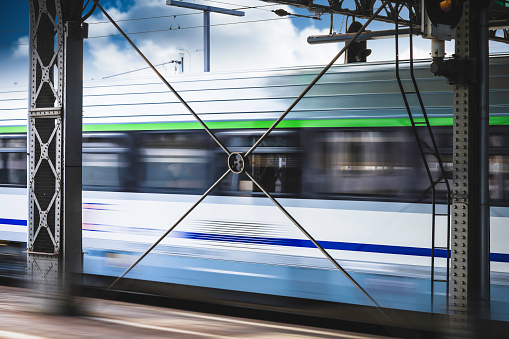 Tokyo, Japan - May 31, 2012: Driver and passengers at Shibamata Station. Keisei Electric Railway train parked the Shibamata Station in Katsushika, Tokyo, Japan. Shibamata Station is a train station on Keisei Kanamachi Line.