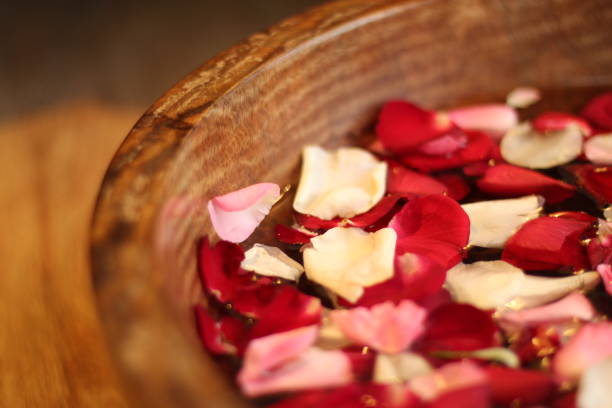 Spa Relaxation rose petals in wooden Traditional Urli Bowl