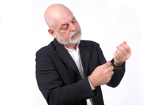 adult man using SeniorLife tablet notebook cell phone communication technology