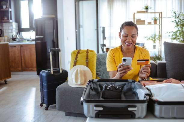 istock African American woman paying ticket online 1586150801