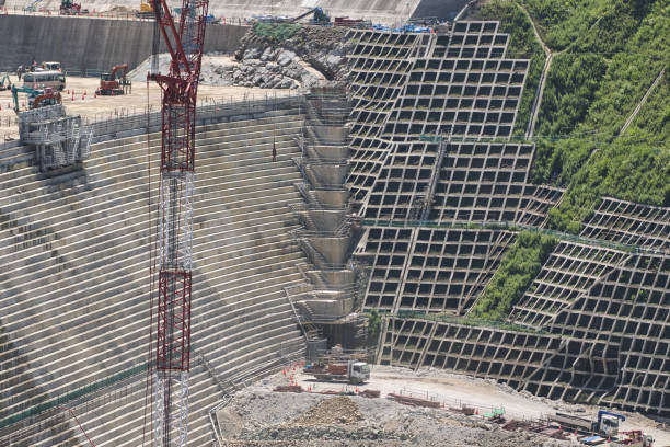 Concrete placement or concrete casting at construction of Naruse dam in Akita, Japan Akita, Japan - July 29, 2023: Concrete placement or concrete casting at construction of Naruse dam in Akita, Japan japanese akita stock pictures, royalty-free photos & images