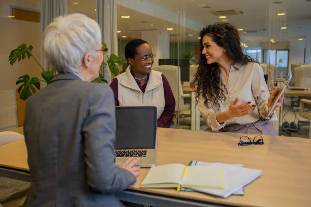 istock Business colleagues having a conversation 1586236094