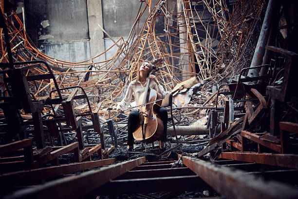 Cello playing cellist musician file_thumbview_approve.php?size=1&id=20216519 chamber orchestra stock pictures, royalty-free photos & images