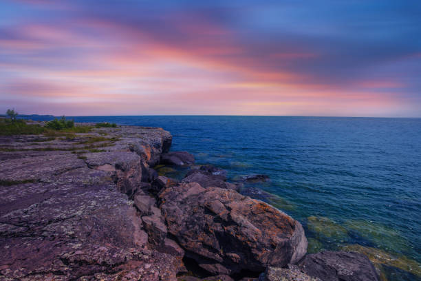 istock Sea ocean and cloudy sky background. sunset. 1586305871
