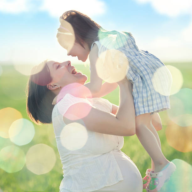 istock Pregnant woman with her daughter 158632381