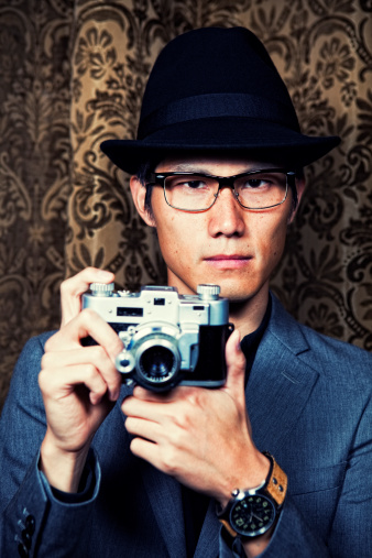 Portrait of a vintage Japanese photo journalist. iStockalypse Japan 2010.