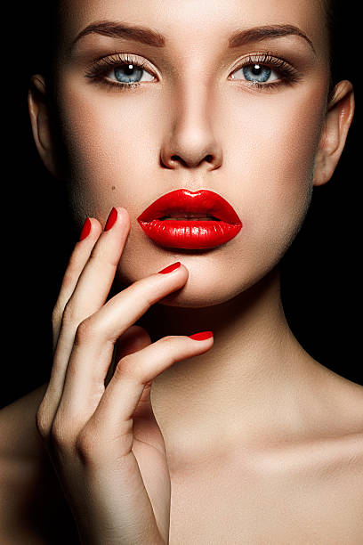 istock Beautiful woman with red lips 158636500