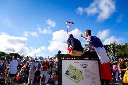 Lisbon, Portugal. August 01 2023. Pilgrims from all over the world attend the opening mass of the World Youth Day at  Eduardo VII Park, in the Portuguese capital.