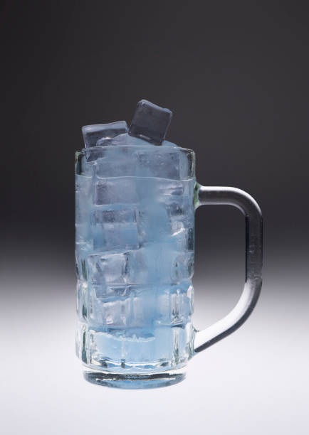 Frozen water breaking glass cup through expansion Thailand Asia