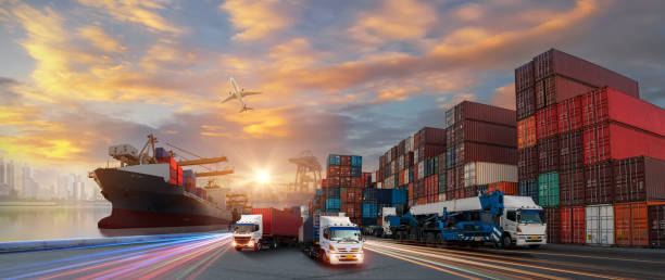 istock Logistics and transportation of Container Cargo ship and Cargo plane with working crane bridge in shipyard at sunrise, logistic import export and transport industry background 1586403220