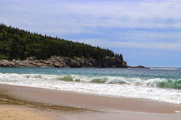istock Crashing waves at Acadia National Park beach. 1586514059