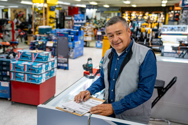 istock Business owner working at a hardware store 1586523435