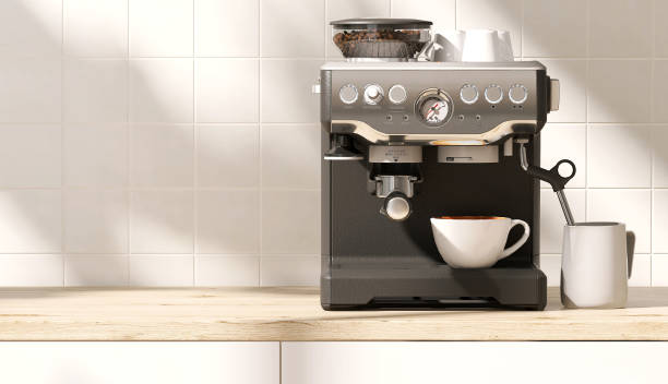 istock Black, silver professional espresso making machine, white coffee cup on wood countertop cabinet counter in sunlight, leaf shadow on white square tile wall 1586611331