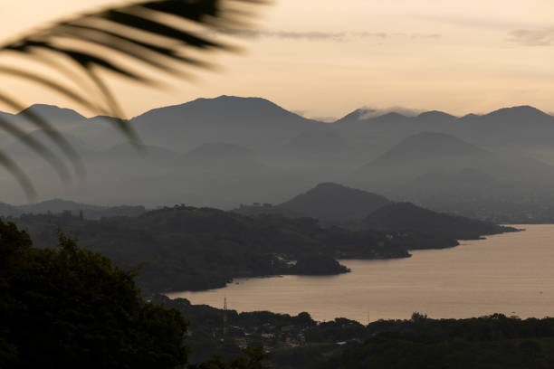 Aerial sunset view of Lake Catemaco and surrounding Sierra de Los Tuxtlas Mountains of Veracruz, Mexico.