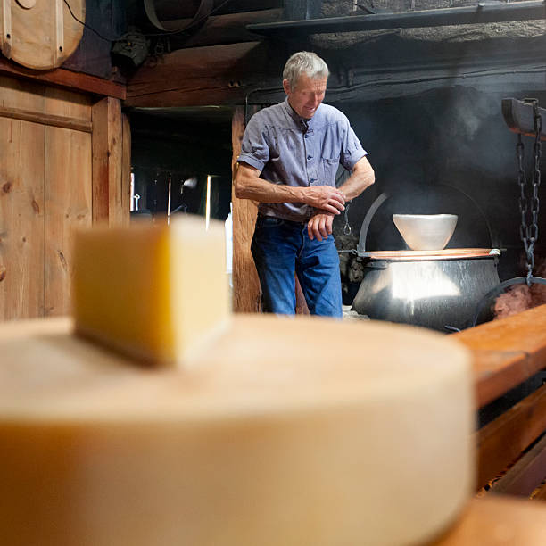 istock Swiss Traditional Cheesemaker Looking at Wrist Watch. 158663142