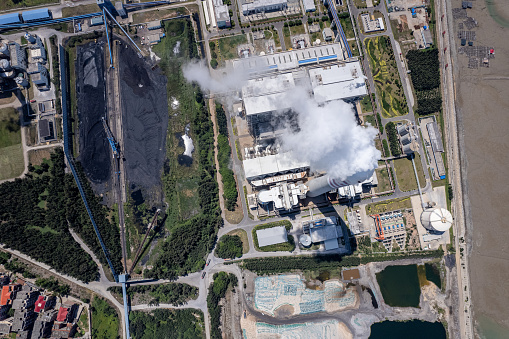 Vertical aerial view of chemical plant buildings and equipment