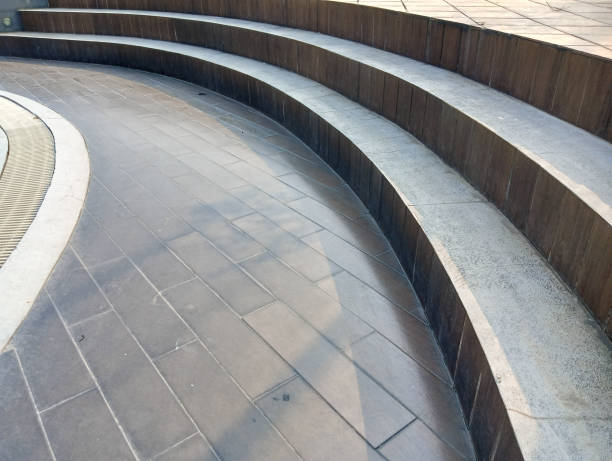 istock outdoor curved staircase, swimming pool side. 1586651796