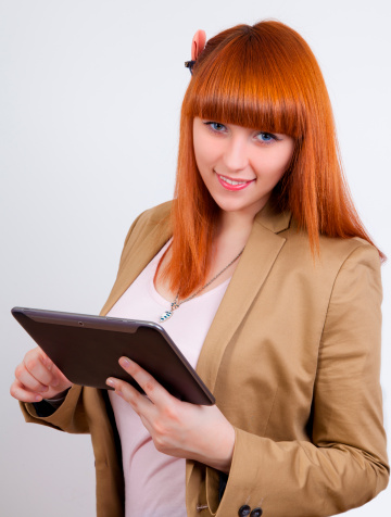 smiling young business woman with a Tablet PC
