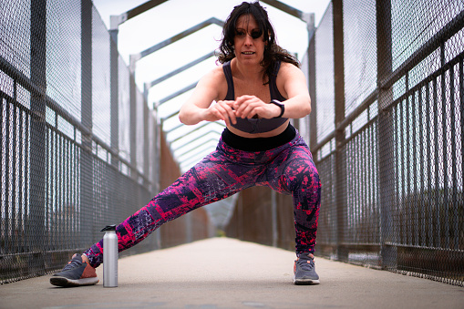 After-Exercise Serenity: 40-Year-Old Argentine Woman Enjoys Outdoor Stretch