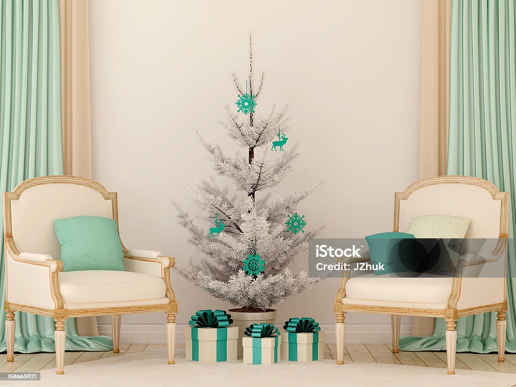 Two classic chairs and white Christmas tree Christmas interior with beautiful promptness beige and blue colors and consisting of two chairs and a Christmas tree Armchair Stock Photo