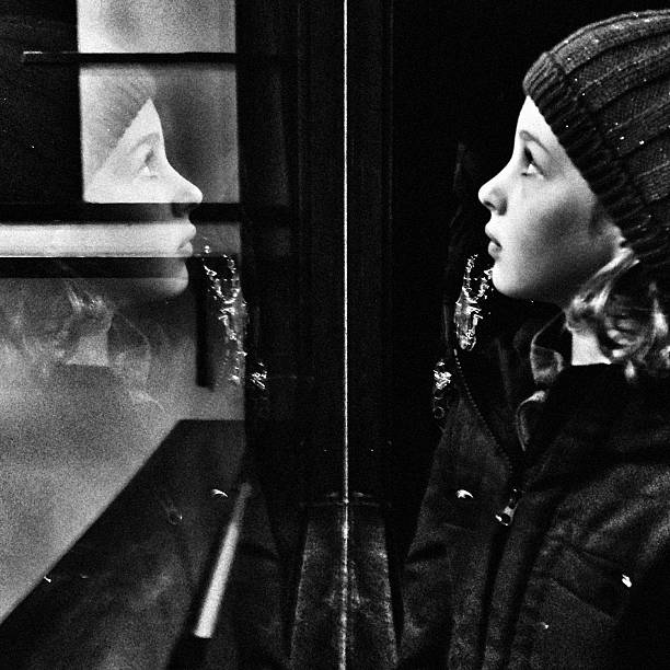 istock Reflection of a young girl in profile 158669885