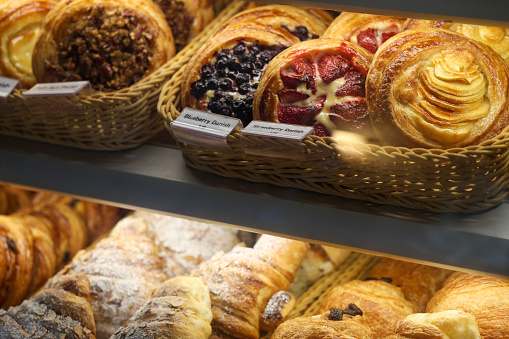 A popular french bakery full of delicious pastries and treats. Powdered sugar covered delicious croissants and cheese filled danish.