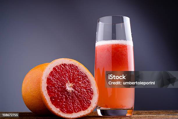 Rosso Succo Di Pompelmo - Fotografie stock e altre immagini di Acido ascorbico - Acido ascorbico, Agrume, Alimentazione sana