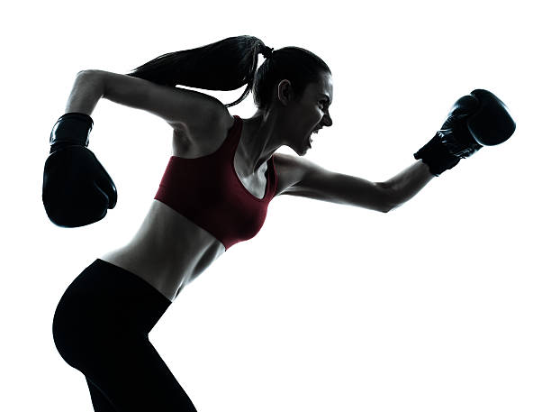 istock beautiful woman exercising boxe 158675858