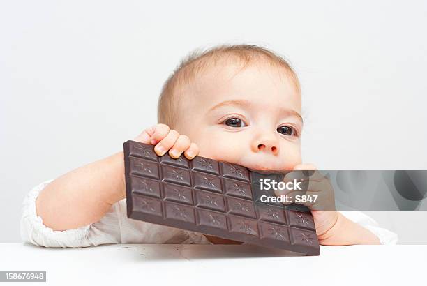 Baby Chocolate Stock Photo - Download Image Now - 6-11 Months, Baby - Human Age, Biting