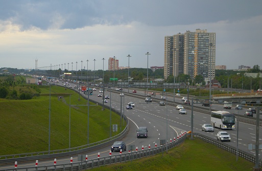 Russia, St. Petersburg - July 24, 2023: The movement of cars on the traffic intersection