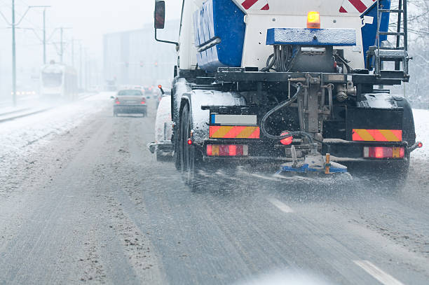 istock snowblower in the street during at winter 158681332