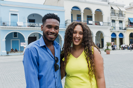 portrait of african american couple in colonial city in Latin America, afro caribbean black people