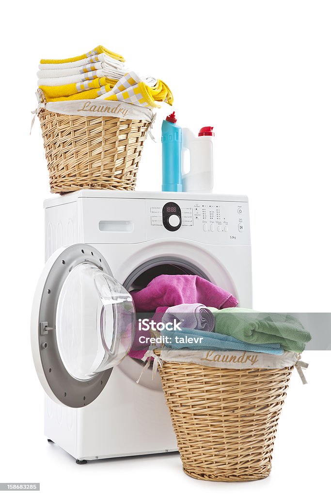 Washing Laundry Laundry basket with colorful towel and washing machine Clothing Stock Photo