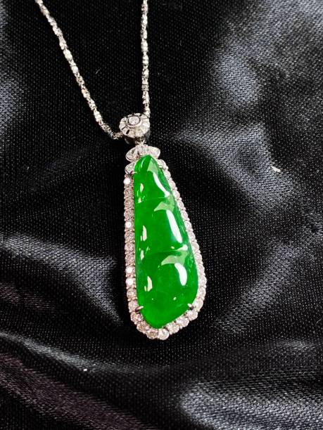 istock Exquisite pendant from sterling silver and an antique jade 1586855640