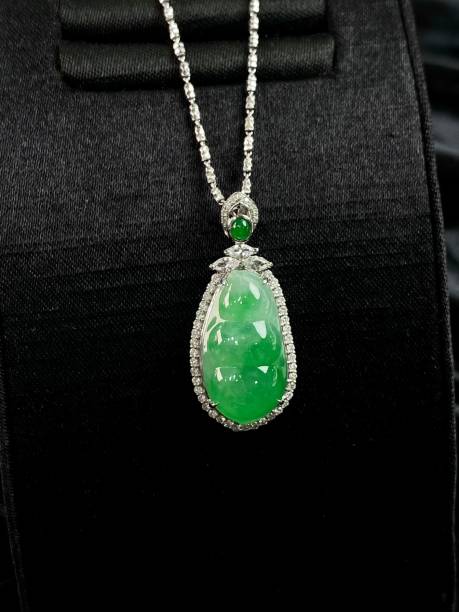 istock Exquisite pendant from sterling silver and an antique jade 1586855649