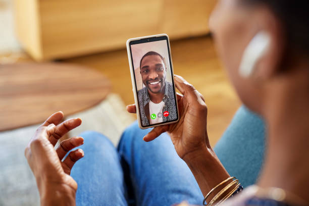 istock Woman doing video call with her husband at home 1586916242