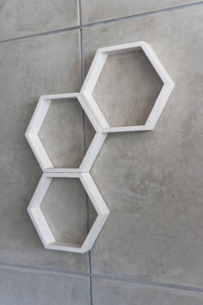 istock Hexagonal white painted wall decoration on industrial style wall 1586918965